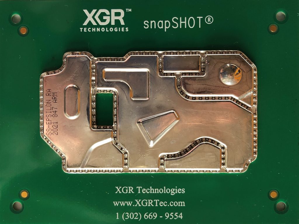 Snapshot shield attached to a printed circuit board